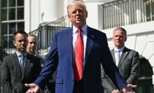 donald trump addresses the media on the South Portico of the White House
