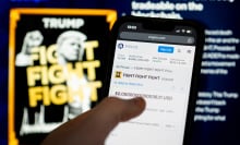 User buying $TRUMP on mobile device with memecoin website in the background