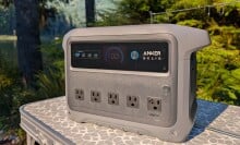 the anker solix c1000 gen 2 on a camping table in the woods