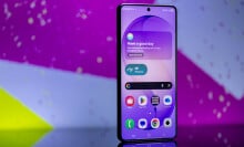 samsung galaxy s26 ultra posed in front of purple background