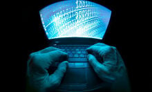 Fish-eye lens view of a computer screen with hacking stuff on it