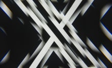 A kaleidoscopic picture of a black and white X logo.