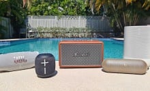 best waterproof speakers arranged next to a pool
