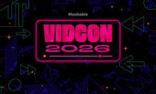 The words "VidCon 2026" in pink on a black background