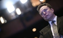 Elon Musk, SpaceX CEO, looking into the distance. 