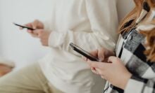 Phones in hand