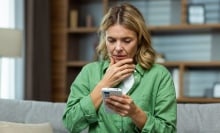 Worried parent uses phone to track child's location. 