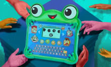 Toy Story 5 Explore & Learn Lilypad appears surrounded by children's hands reaching for the tablet.