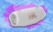 JBL Charge 6 portable speaker against a light blue patterned background