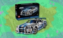 lego technic 2 fast 2 furious nissan skyline gt-r (r34) car against a green patterned background