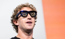 Mark Zuckerberg, chief executive officer of Meta Platforms Inc., wears Orion augmented reality (AR) glasses during the Meta Connect event in Menlo Park, California, US, on Wednesday, Sept. 25, 2024