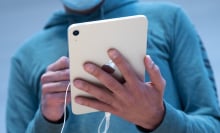 User holding an iPad