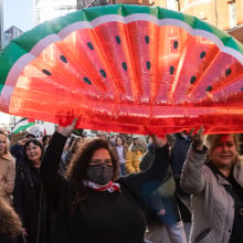 Pro-Palestinian protesters holding an inflatable water melon, a symbol of resistance in occupied Palestine, take part in an Armistice Day march from Hyde Park to the US embassy to call for an immediate ceasefire in Gaza on 11th November 2023 in London, United Kingdom. The march was organised by Palestine Solidarity Campaign (PSC), Stop the War Coalition, Friends of Al-Aqsa, Muslim Association of Britain and Palestinian Forum in Britain. Mass Palestinian solidarity rallies have been held around the world for a fifth consecutive weekend to call for an end to the Israeli bombardment of Gaza.