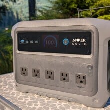 the anker solix c1000 gen 2 on a camping table in the woods