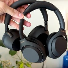 sony xm5 and xm6 headphones held in hand