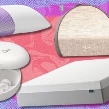 a purple harmony pillow, anker soundcore sleep A30 earbuds, hatch restore 3 alarm clock, and zinus mattress on a coral and purple colored background