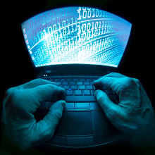 Fish-eye lens view of a computer screen with hacking stuff on it