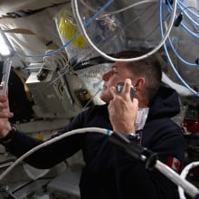 Artemis II mission specialist astronaut Jeremy Hansen enjoys a shave inside the Orion spacecraft during Flight Day 5 and ahead of the crew's lunar flyby on April 6, 2026.