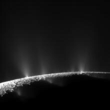 Enceladus spraying plumes into space