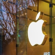 Apple logo on glass window