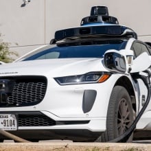 A Waymo EV charges up.