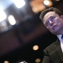 Elon Musk, SpaceX CEO, looking into the distance. 
