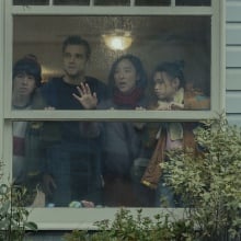 A family panics inside their home in a still from Netflix's "The Last House."
