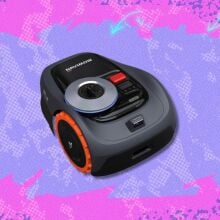 the Segway Navimow i110N on a purple background