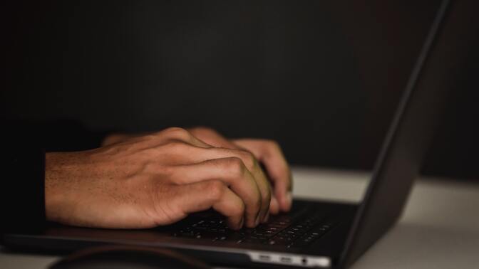 Hands on laptop