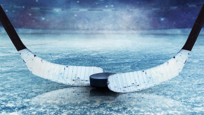two hockey sticks during face off
