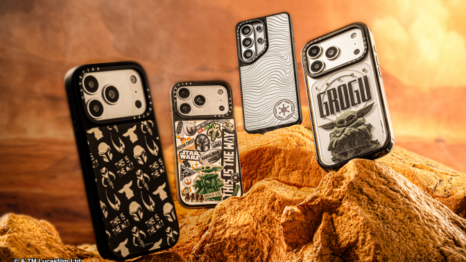 several Casetify phone cases from the Mandalorian™ and Grogu collection on a rocky terrain