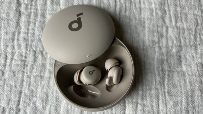 soundcore sleep a20 earbuds on bed