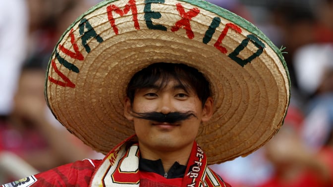 A fan of South Korea wearing a sombrero at the 2026 World Cup in Mexico.
