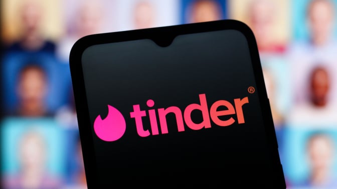 tinder logo on phone