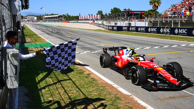 Race winner Lewis Hamilton of Great Britain driving the (44) Scuderia Ferrari
