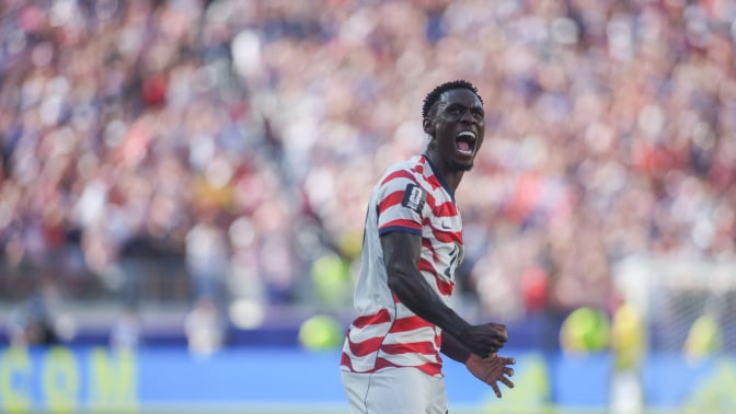 USA player Balogun celebrates at the World Cup