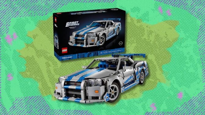 lego technic 2 fast 2 furious nissan skyline gt-r (r34) car against a green patterned background