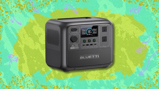 bluetti ac70 portable power station against a green patterned background