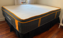 tall mattress with spots of copper on the surface