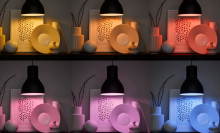 A lamp displaying home goods in six different colors.