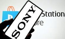 In this photo illustration, a Sony logo is seen displayed on