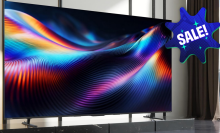Toshiba z670r tv on display in room with sale sticker in corner