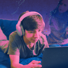 Teen son focuses on chatbot while parent tries to get their attention in background.
