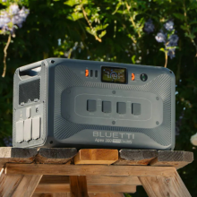 Bluetti Apex 300 portable power station sitting on table outdoors