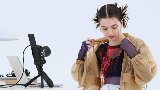 woman taking photo with Canon EOS R50 V camera on tripod