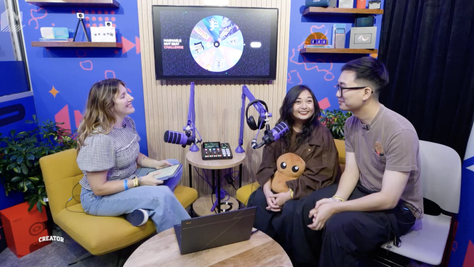 People in a podcast studio being interviewed. 
